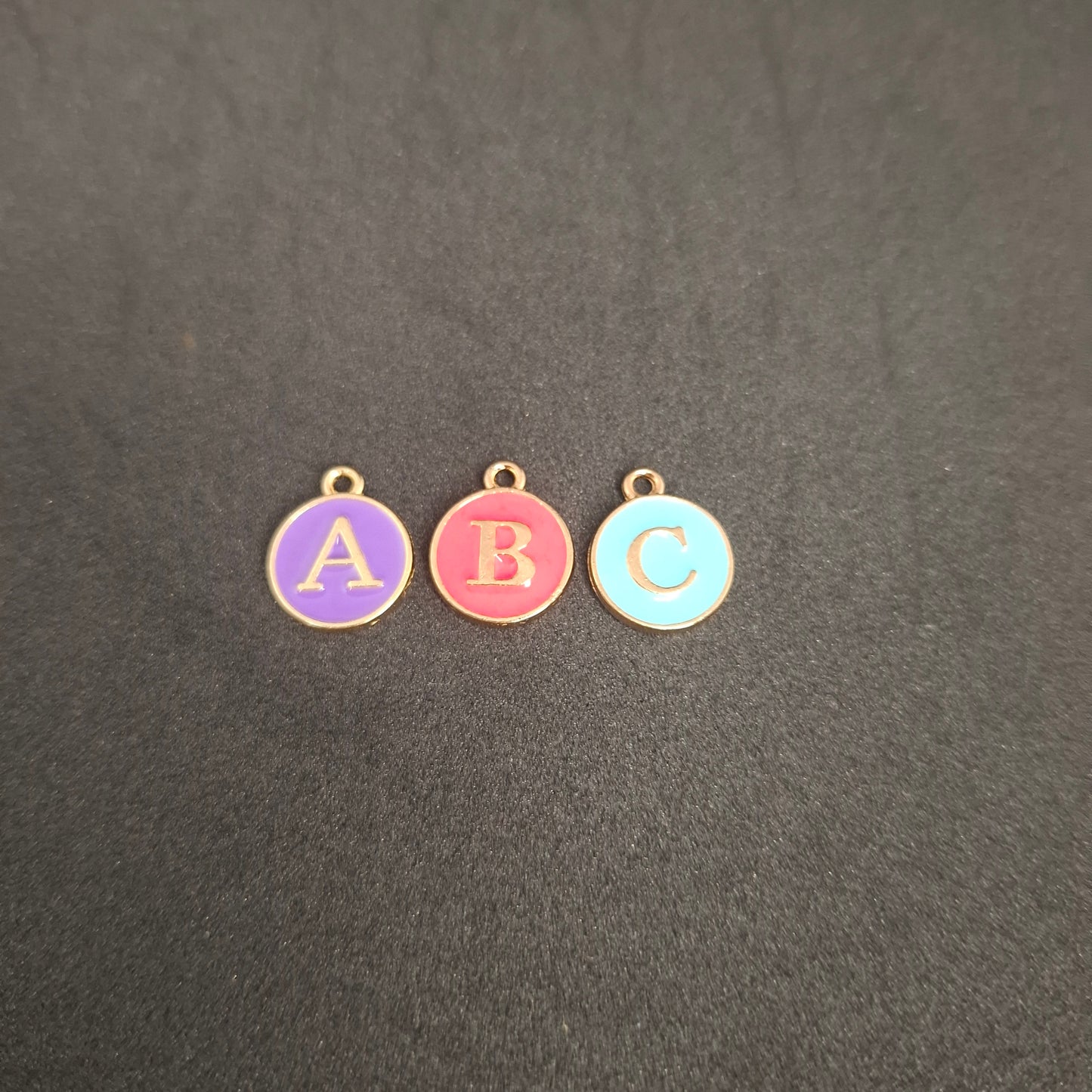Coloured letter charms
